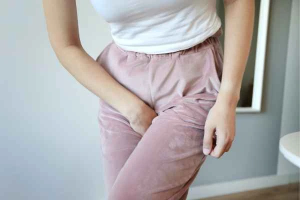 woman struggling with urine incontinence Kingston upon Thames